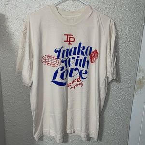 Inaka Power shirt in size L